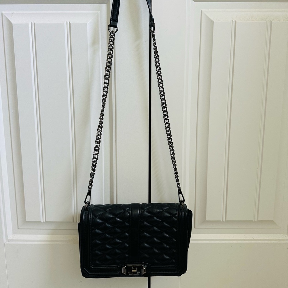 Rebecca Minkoff Quilted Black Leather crossbody bag with detachable chain strap.